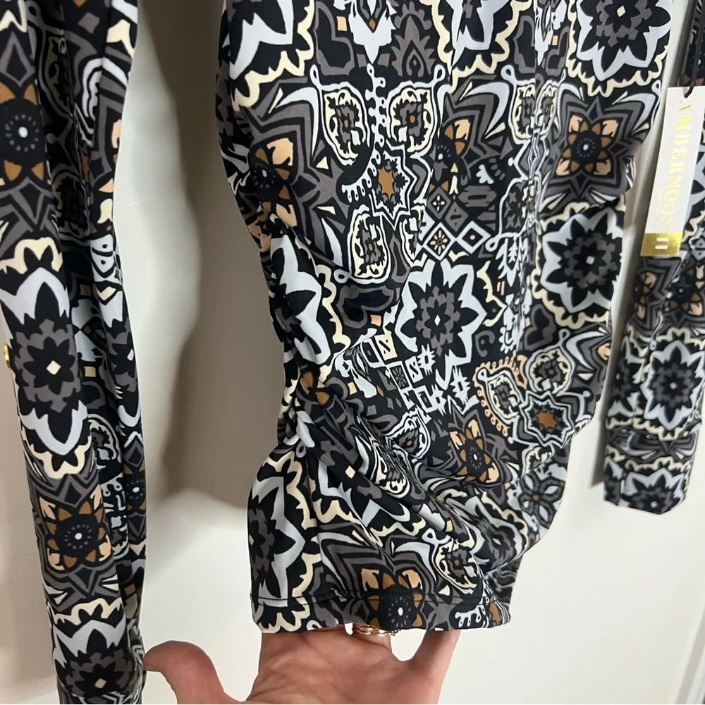 Ambernoon II by Dr. Erum Ilyas Floral Print 1/4 Zip Roll Tab Sleeve Rash Guard